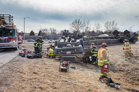Firemen rescue two trapped occupants of a tractor trailer that rolled over in Long Grove IL 3-18-15 Larry Shapiro photographer shapirophotography.net